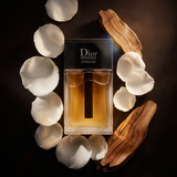 Dior Homme Intense men's perfume bottle with sleek design and dark accents, showcasing luxury fragrance packaging.