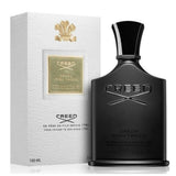 Green Irish Tweed Creed men's fragrance bottle in green and silver, 100ml, with the Creed logo visible on the packaging.