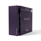 Dior Sauvage men's fragrance box with a sleek black bottle and minimalist packaging, displayed on a neutral background.