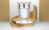 Invictus Paco Rabanne men's 100ml perfume bottle with a sleek design and gold accents, displayed on a neutral background