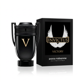 Invictus Victory by Rabanne men's perfume bottle with sleek design and gold accents, displayed against a neutral background.