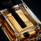 Dior Homme Intense men's perfume bottle with sleek design and dark packaging, showcasing a luxurious fragrance.