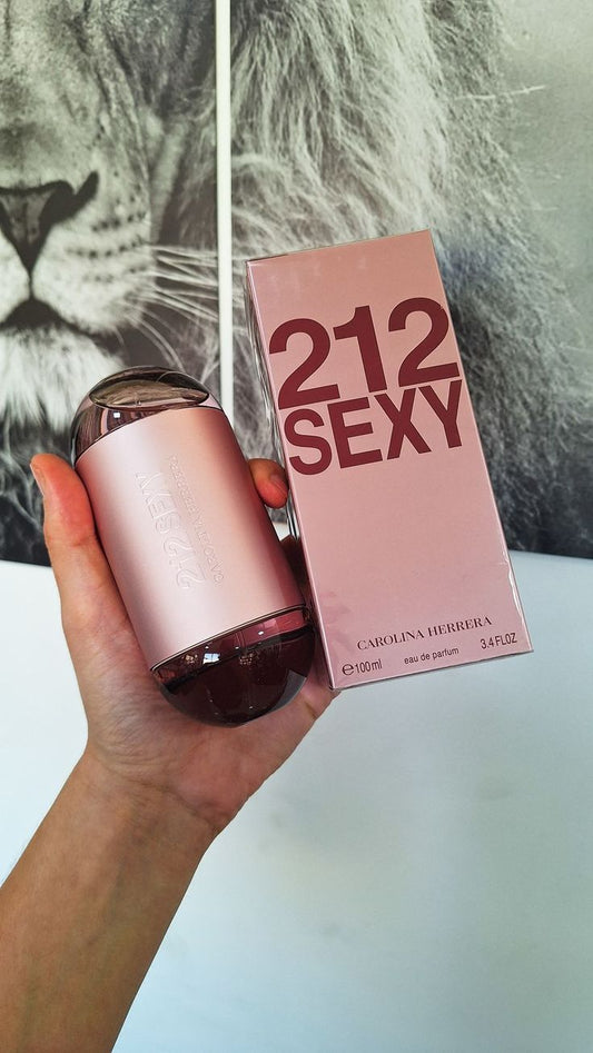 212 Sexy Carolina Herrera perfume for women, featuring a sleek bottle with a modern design and floral accents.