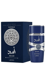 Asad Zanzibar Lattafa perfume bottle for men with intricate gold and black design, displayed against a neutral background.