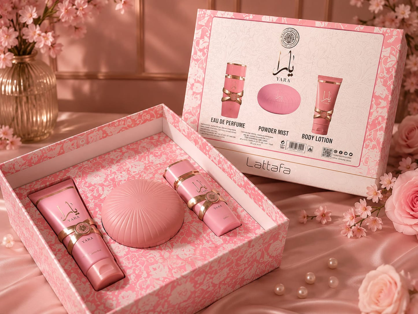Yara Lattafa perfume set with a sleek bottle and matching packaging, displayed with other fragrance accessories.